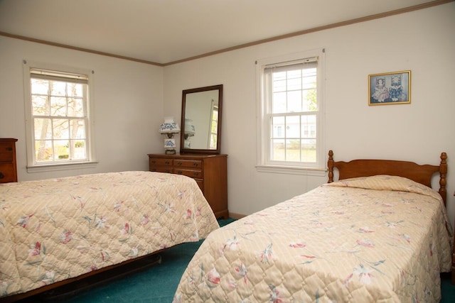carpeted bedroom featuring ornamental molding