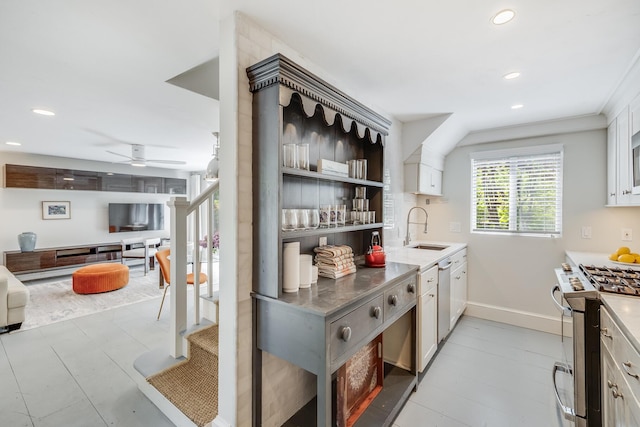 143R Bradford Street Ext Unit 2, Provincetown, MA 02657 - kitchen featuring appliances with stainless steel finishes, a sink, recessed lighting, ceiling fan, and baseboards