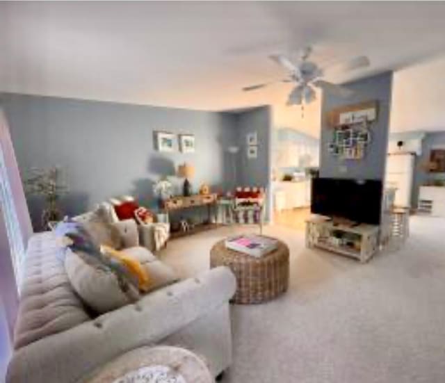 4 Coffey Ln, Dennis Port, MA 02639 - carpeted living area with ceiling fan