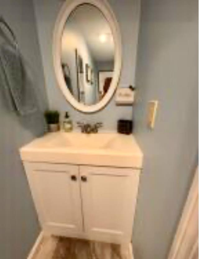 4 Coffey Ln, Dennis Port, MA 02639 - bathroom featuring vanity and baseboards