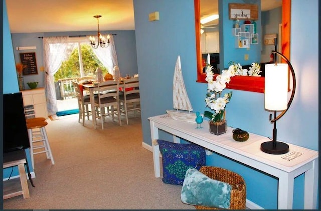 4 Coffey Ln, Dennis Port, MA 02639 - hallway featuring a chandelier and carpet