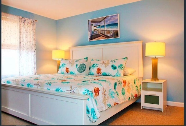 4 Coffey Ln, Dennis Port, MA 02639 - carpeted bedroom with baseboards