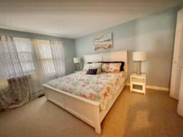 4 Coffey Ln, Dennis Port, MA 02639 - bedroom featuring baseboards and carpet floors