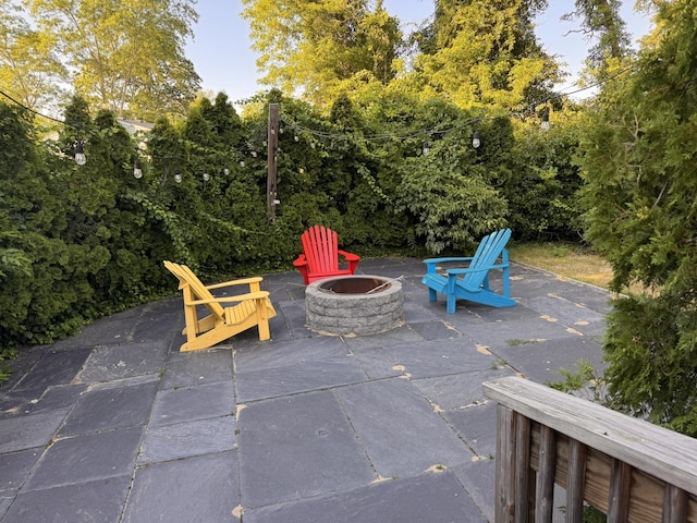 4 Coffey Ln, Dennis Port, MA 02639 - view of patio / terrace featuring a fire pit