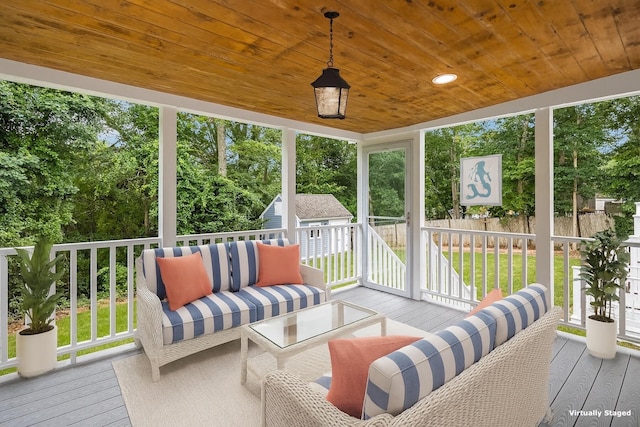 28 Stoney Cliff Rd, Centerville, MA 02632 - sunroom with an outdoor living space and view of wooded area