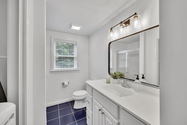 13 Pickerel Way, Forestdale, MA 02644 - full bath with toilet, vanity, a stall shower, tile patterned flooring, and baseboards