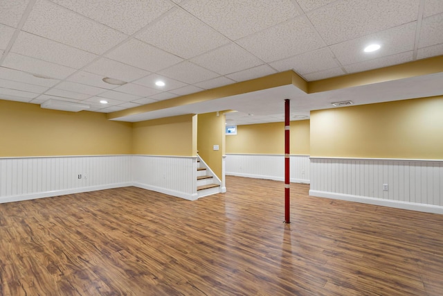 basement featuring wood-type flooring