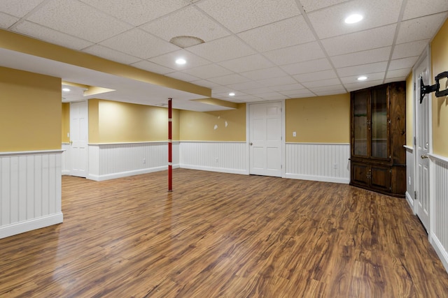 basement featuring wood-type flooring