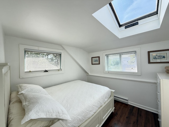 9 Kens Way W, Yarmouth, MA 02673 - bedroom with baseboard heating, a skylight, and dark wood-style floors
