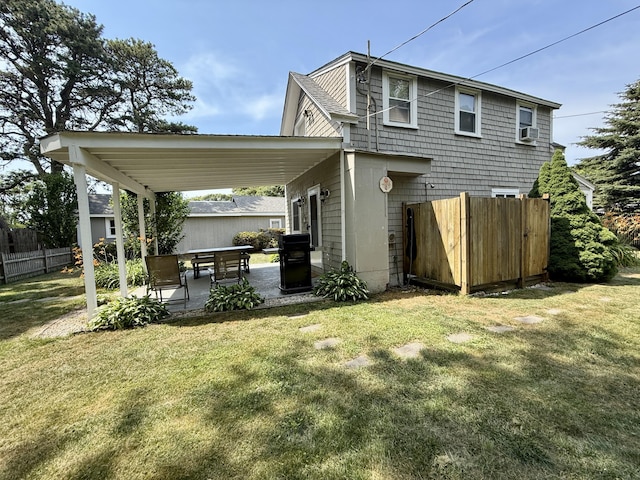 9 Kens Way W, Yarmouth, MA 02673 - back of property featuring a patio area and cooling unit