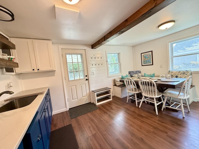 9 Kens Way W, Yarmouth, MA 02673 - dining area featuring dark wood-style flooring and beamed ceiling