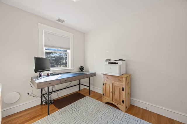 office space featuring hardwood / wood-style floors