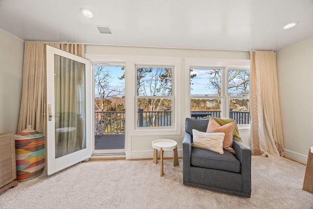 living area with carpet floors