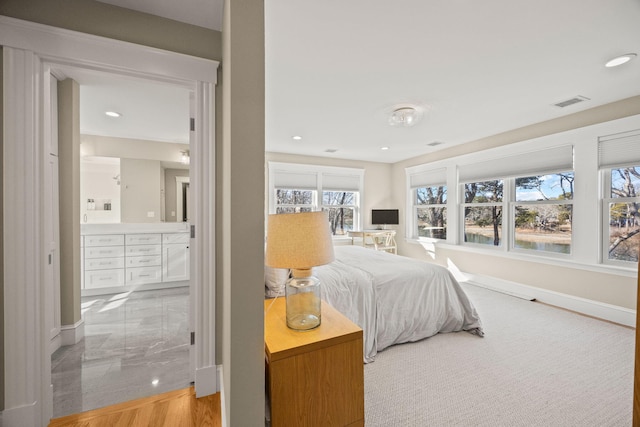 bedroom with ensuite bath