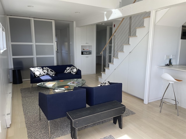 535 Commercial St Unit U1, Provincetown, MA 02657 - living area featuring stairs and light wood finished floors
