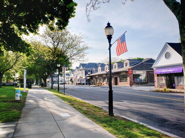103 Braeside Rd, West Falmouth, MA 02540 - view of road with street lights, sidewalks, and curbs