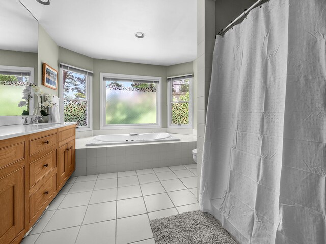 50 View Crest Dr, Falmouth, MA 02540 - bathroom featuring vanity, a garden tub, and tile patterned flooring