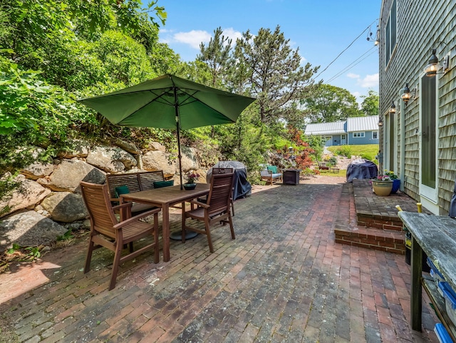 50 View Crest Dr, Falmouth, MA 02540 - view of patio featuring a grill and outdoor dining area