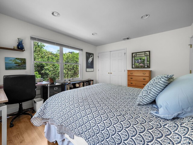 50 View Crest Dr, Falmouth, MA 02540 - bedroom with wood finished floors, a closet, recessed lighting, and a desk