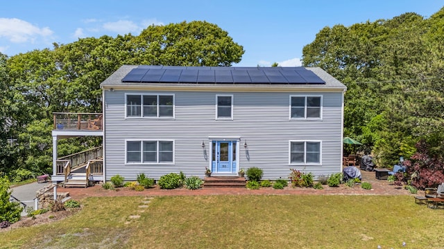 50 View Crest Dr, Falmouth, MA 02540 - view of front of house with a front yard and solar panels