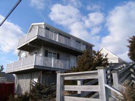 99 Shore Blvd Unit A, East Sandwich, MA 02537 - view of front facade with a balcony