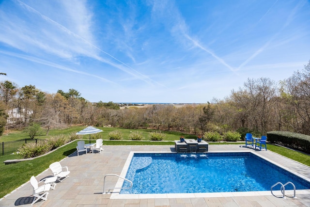 swimming pool featuring a patio area