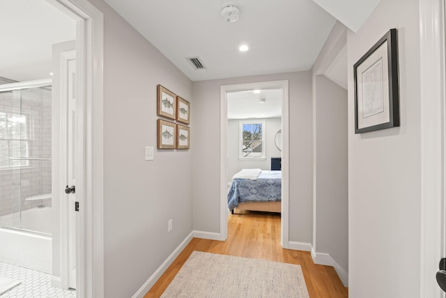 hall featuring light wood-type flooring