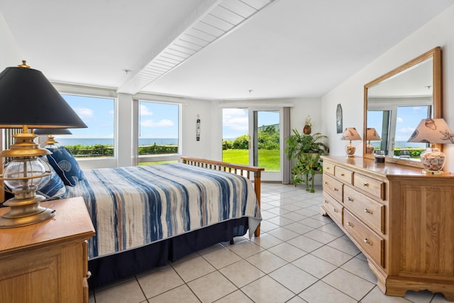 bedroom featuring light tile patterned flooring