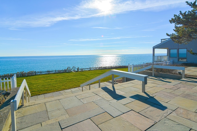 view of patio / terrace featuring a water view