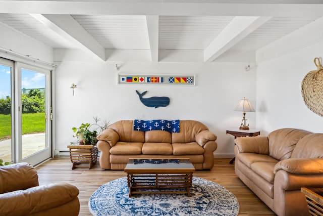 living room with light hardwood / wood-style flooring, a baseboard radiator, and beamed ceiling