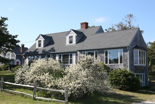 14 Trinity Cv, West Harwich, MA 02671 - view of property exterior with a chimney and roof with shingles