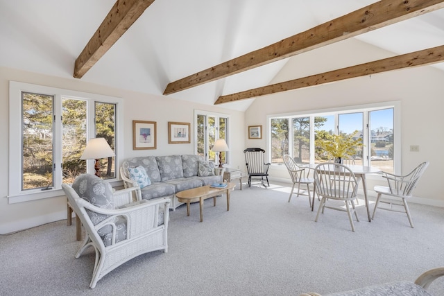 living room featuring high vaulted ceiling, carpet flooring, baseboards, and beam ceiling