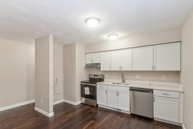 20 Yankee Dr, Brewster, MA 02631 - kitchen featuring stainless steel appliances, a sink, under cabinet range hood, and dark wood-type flooring