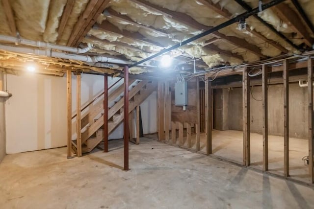 20 Yankee Dr, Brewster, MA 02631 - unfinished basement featuring stairs and electric panel