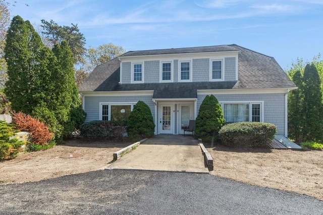 20 Yankee Dr, Brewster, MA 02631 - view of front of house featuring asphalt driveway