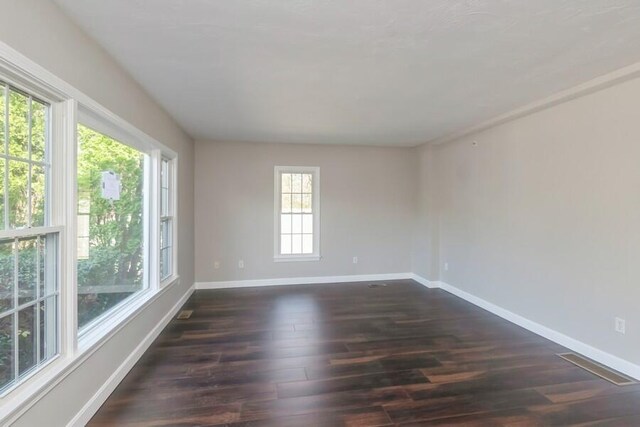 20 Yankee Dr, Brewster, MA 02631 - unfurnished room featuring dark wood-style floors and baseboards
