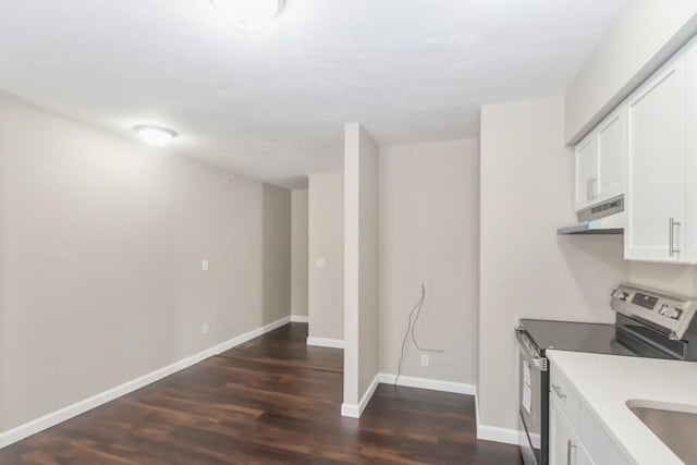 20 Yankee Dr, Brewster, MA 02631 - laundry room featuring dark wood-type flooring and baseboards