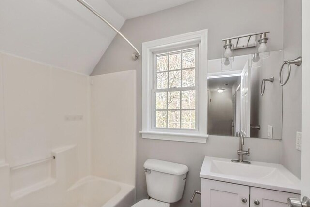 20 Yankee Dr, Brewster, MA 02631 - bathroom featuring toilet, vanity, lofted ceiling, and washtub / shower combination