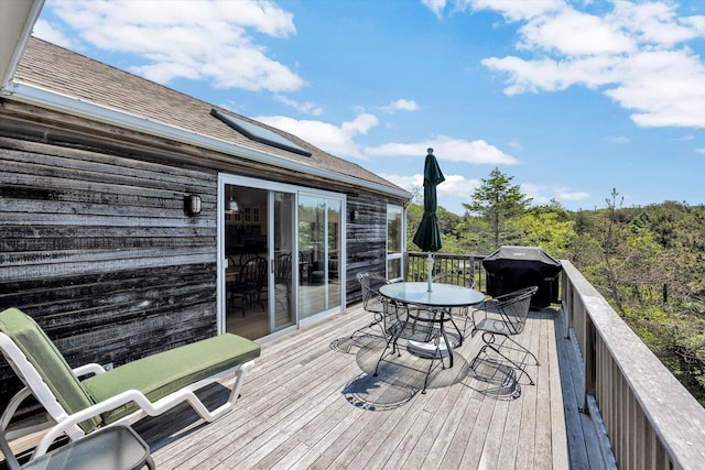 3 Amber Way, Truro, MA 02666 - wooden deck featuring grilling area and outdoor dining space