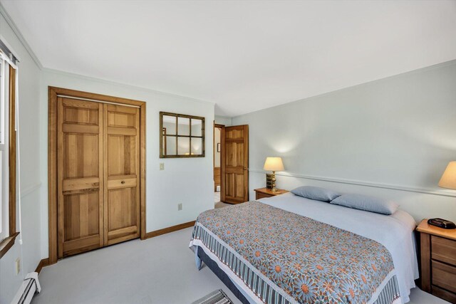 3 Amber Way, Truro, MA 02666 - carpeted bedroom with a baseboard heating unit and baseboards