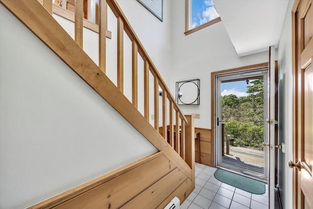 3 Amber Way, Truro, MA 02666 - foyer entrance featuring plenty of natural light, stairs, light tile patterned floors, and a towering ceiling