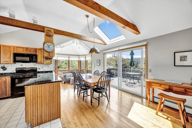 3 Amber Way, Truro, MA 02666 - dining space with a skylight, light wood-type flooring, and baseboard heating