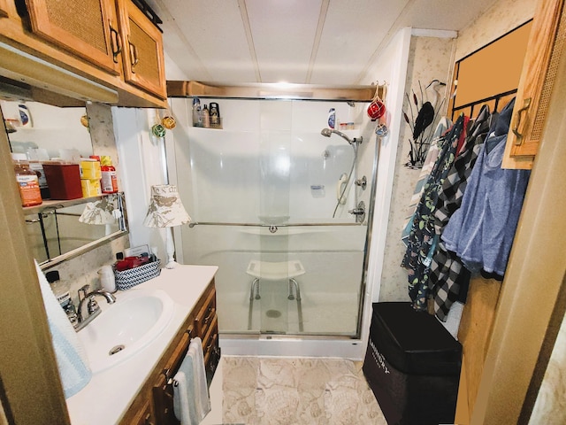 310 Old Chatham Rd Unit H-12, South Dennis, MA 02660 - full bathroom with a stall shower, vanity, and marble look tile flooring