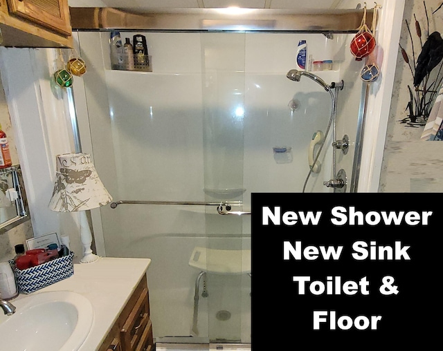 310 Old Chatham Rd Unit H-12, South Dennis, MA 02660 - bathroom featuring a stall shower and vanity