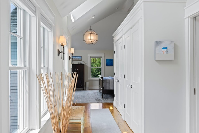 29 Point St, Provincetown, MA 02657 - corridor featuring light wood-type flooring and vaulted ceiling