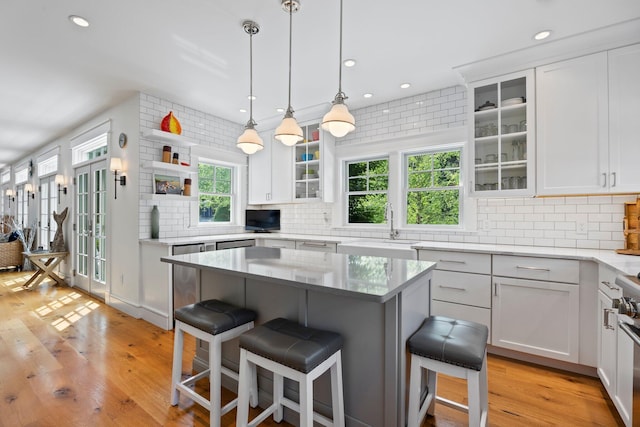 29 Point St, Provincetown, MA 02657 - kitchen featuring a kitchen breakfast bar, plenty of natural light, tasteful backsplash, and recessed lighting
