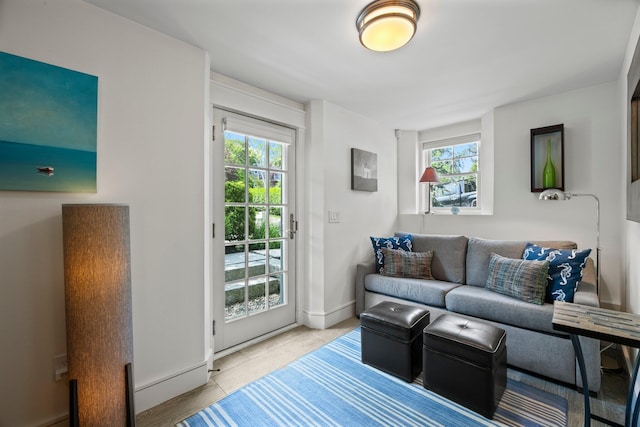 29 Point St, Provincetown, MA 02657 - living area featuring baseboards and tile patterned flooring