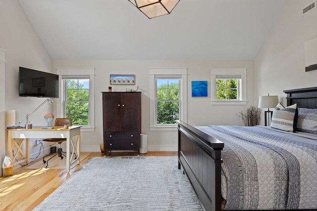 29 Point St, Provincetown, MA 02657 - bedroom featuring lofted ceiling, wood finished floors, an office area, and baseboards
