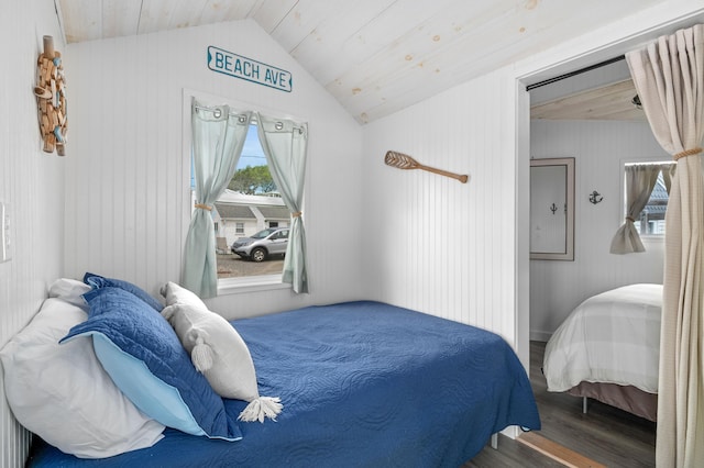 241 Old Wharf Rd Unit 90, Dennis Port, MA 02639 - bedroom with wood finished floors, vaulted ceiling, wooden walls, and wooden ceiling