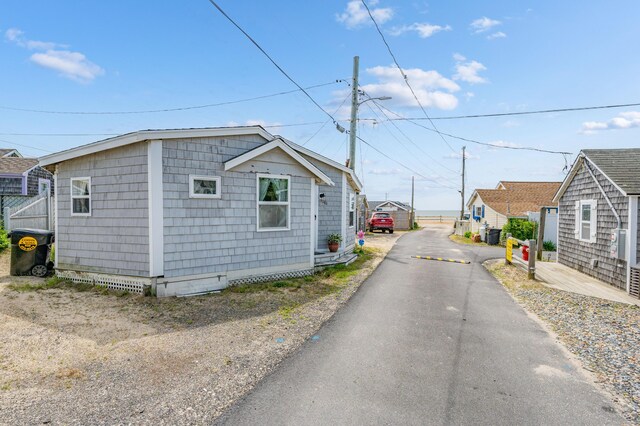 241 Old Wharf Rd Unit 90, Dennis Port, MA 02639 - view of asphalt road featuring street lighting